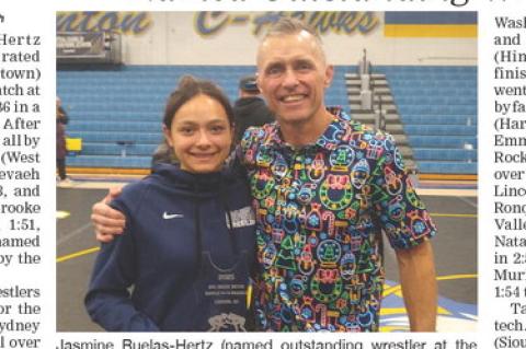 Jasmine Ruelas-Hertz (named outstanding wrestler at the Canton tournament) pictured with Jeremy Ask, tournament director and Canton assistant coach. Courtesy Photo