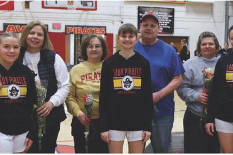 Avon Senior Lady Pirates were honored during Senior Night on Thursday, February 12. Pictured from left are Kate Swier, daughter of Scott and Teresa Swier; Abby Gretschmann, daughter of Connie and Gene Gretschmann; and Alexis Vanderlei, daughter of Amy and