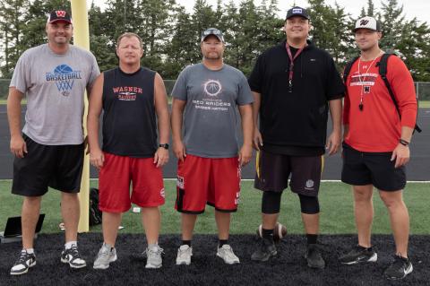 Pictured are Coaches, from left: Mike Koupal, Jason Knebel, Riley Kirwan, Trevor Greger, and Hunter Hewitt. Not pictured: Corbin Johnson and Preston Nedved.