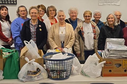 Auxiliary members in attendance with the food pantry donation are pictured back row, from left: Pam Bastemeyer, Kathy Zolnowsky, Dolores Kotab, Barb Wiechmann, Agnes Nedved, Rita Krcil, Eleanor Andersh, Sandy Seiner, and Jeanette Fuchs; front, from left: 