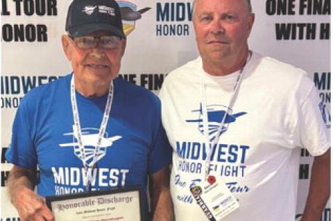 Don Sternhagen with his son, Steve Sternhagen of Yankton, who served as Don's guardian on the Midwest Honor Flight trip.