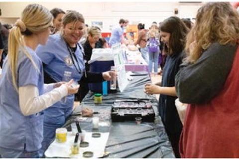 EIGHTH GRADERS ATTEND CAREER FAIR AT WAGNER ARMORY