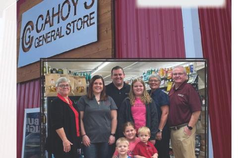 “THIS INCREDIBLE HONOR BELONGS TO OUR EMPLOYEES AND CUSTOMERS – THE HEART OF OUR CAHOY’S FAMILY...' - DAN CAHOY Pictured, from left: Roberta Witt, Trisha Cahoy, Dan Cahoy, Brielle Cahoy (in jacket), Kathy Cahoy, and Steve Cahoy. Kids in front: Bridg