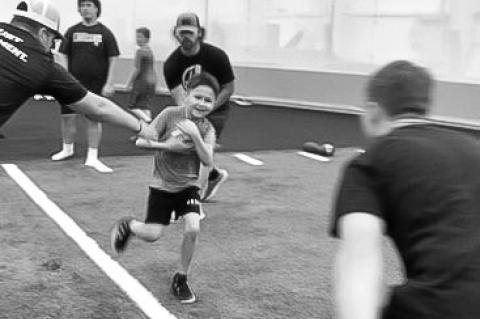 LHOTAK AND LANCERS CO-HOST FOOTBALL CAMP