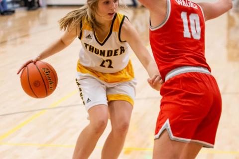 Allison Muckey attempts to get to the basket .