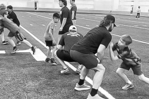 LHOTAK AND LANCERS CO-HOST FOOTBALL CAMP