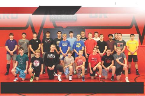 Red Raider wrestlers, pictured back row, from left, are: Rowdy Meyer, Mason Turner, Cooper Robertson, Tristin Cournoyer, Colin Brown Bear, Tom Krcil, Brayden Kreber, Frank Krcil, Bodie Chafin, Hunter Wiechmann, Gannon Knebel, Wade Kreeger, Nelson McBride,