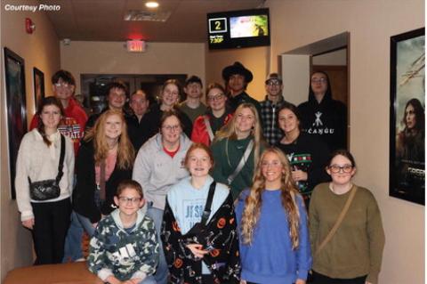HIGH SCHOOL CHOIR STUDENTS VENTURE TO MITCHELL TO TAKE IN