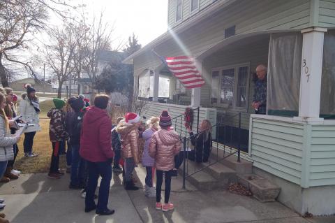 CHRISTMAS CAROLS FILL THE AIR