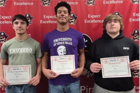 All-State recipients, pictured from left, are: Trenton Soukup - Honorable Mention, Al'Shamon Gunter - Tight End, and Randall Powers - Offensive Line.