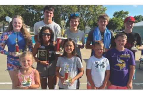 Pictured are the swimmers who placed at the meet. Back row, from left: Presley Slaba, Shea Kjeldgaard, Jackson Rolston, Koy Kjeldgaard and Connor Gabel. Front row, from left: Zoey Petrik, Coach Mel Juffer, Zani Star Comes Out, Kashton Kafka and Maverick Kafka. Not pictured Houston Kocer, Cadee Nelson, Radek Kotab and Grayson Knebel. Courtesy Photos.