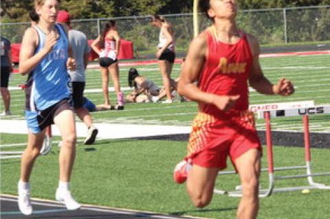 John Fathke leading the 800m run for Avon.